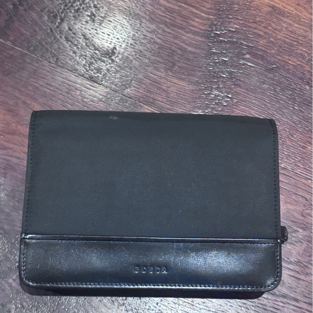 - Black  Bag it can also be a wallet